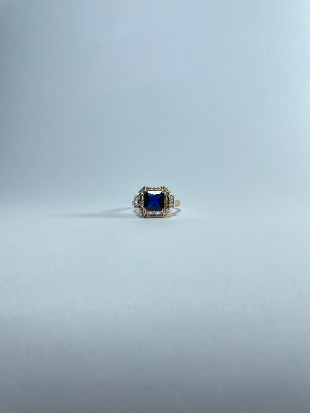 Octagonal Blue Gemstone Halo Ring