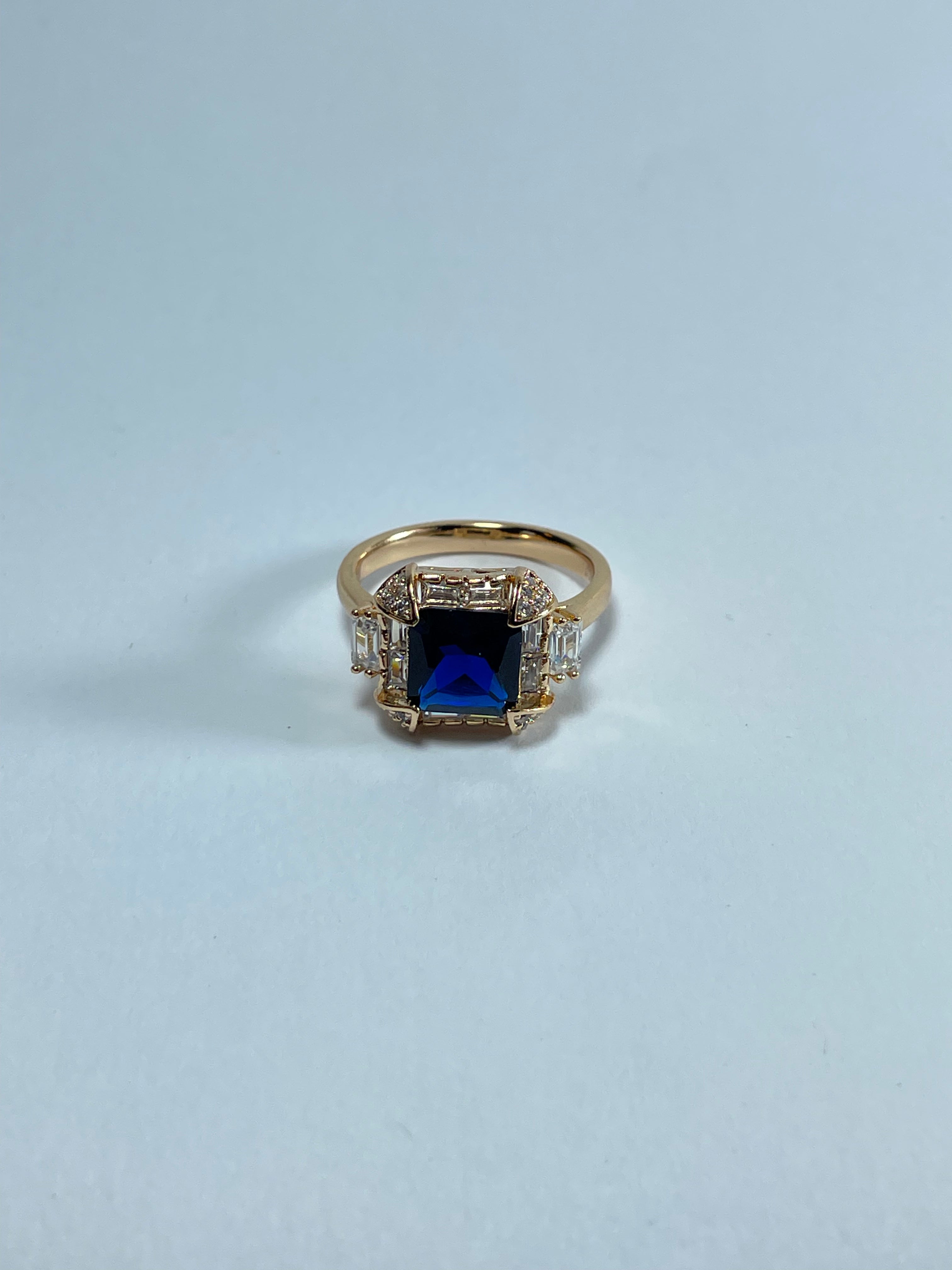 Octagonal Blue Gemstone Halo Ring