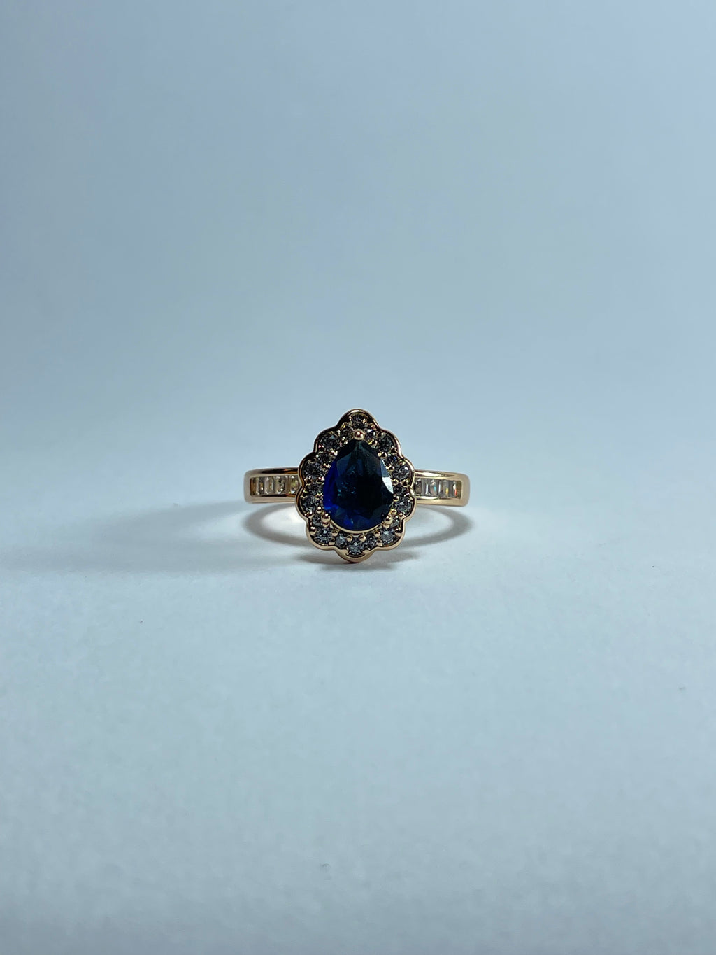 Pear-Cut Blue Gemstone Halo Ring