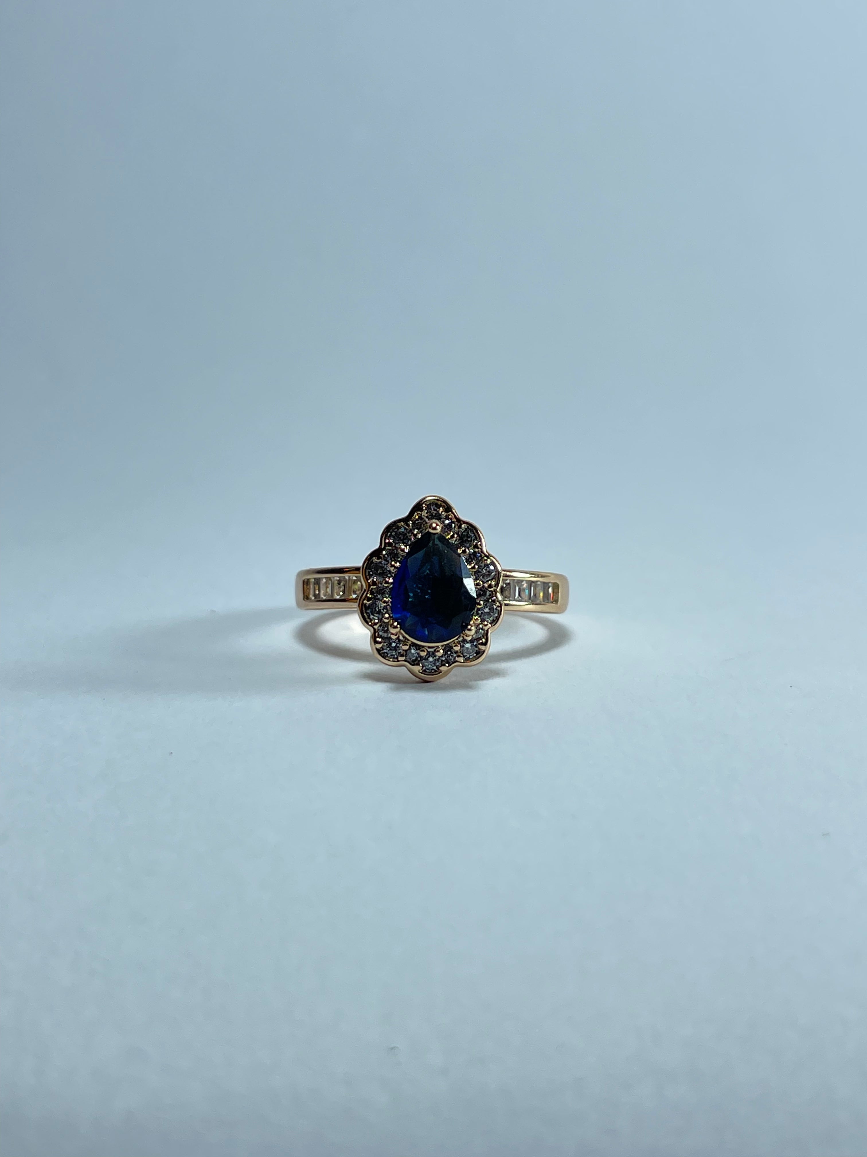 Pear-Cut Blue Gemstone Halo Ring