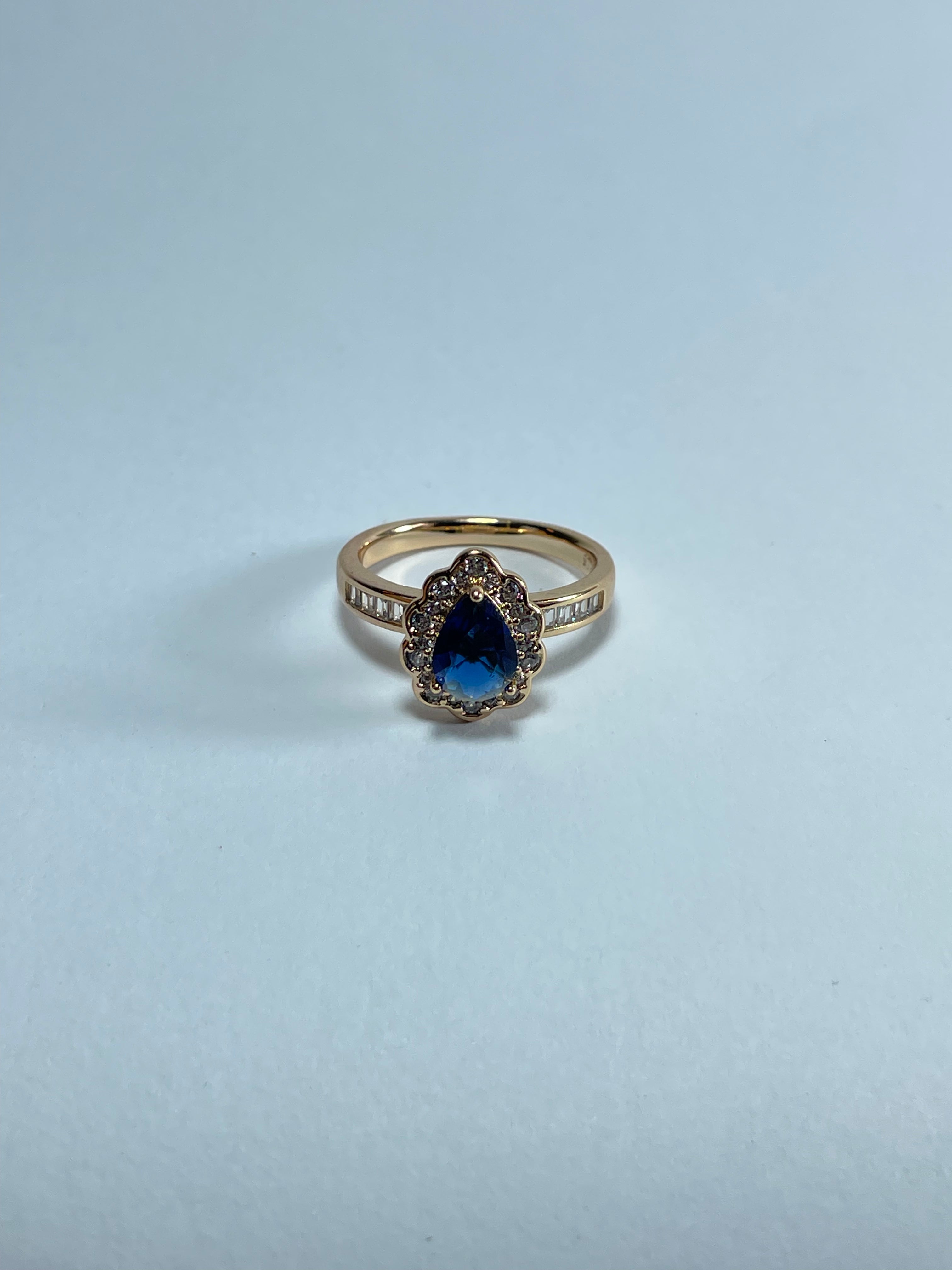 Pear-Cut Blue Gemstone Halo Ring