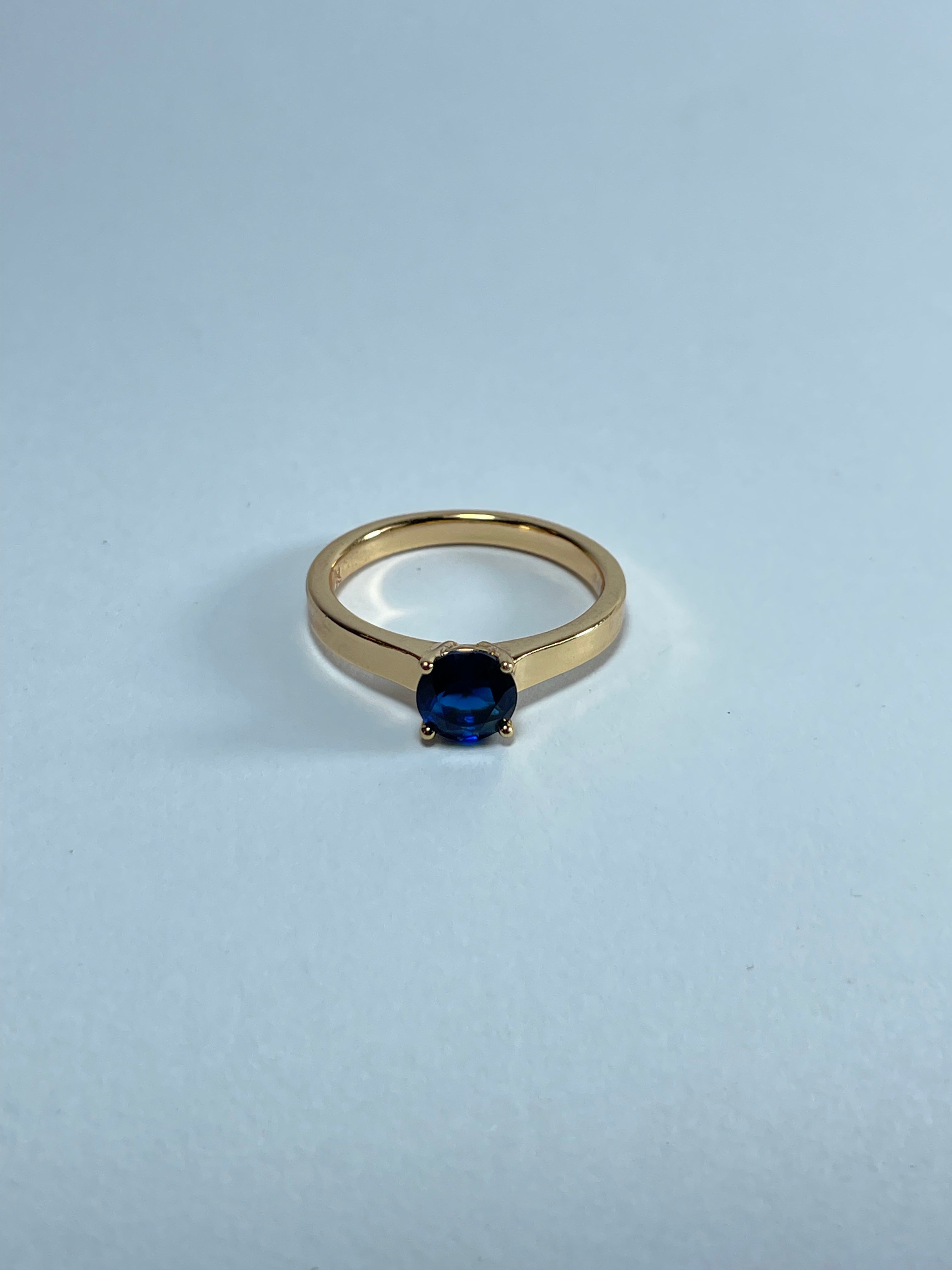 Classic Oval Blue Solitaire Ring