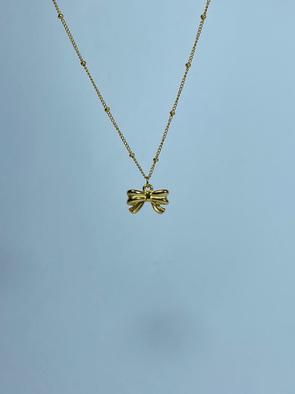Petite Golden Bow Necklace