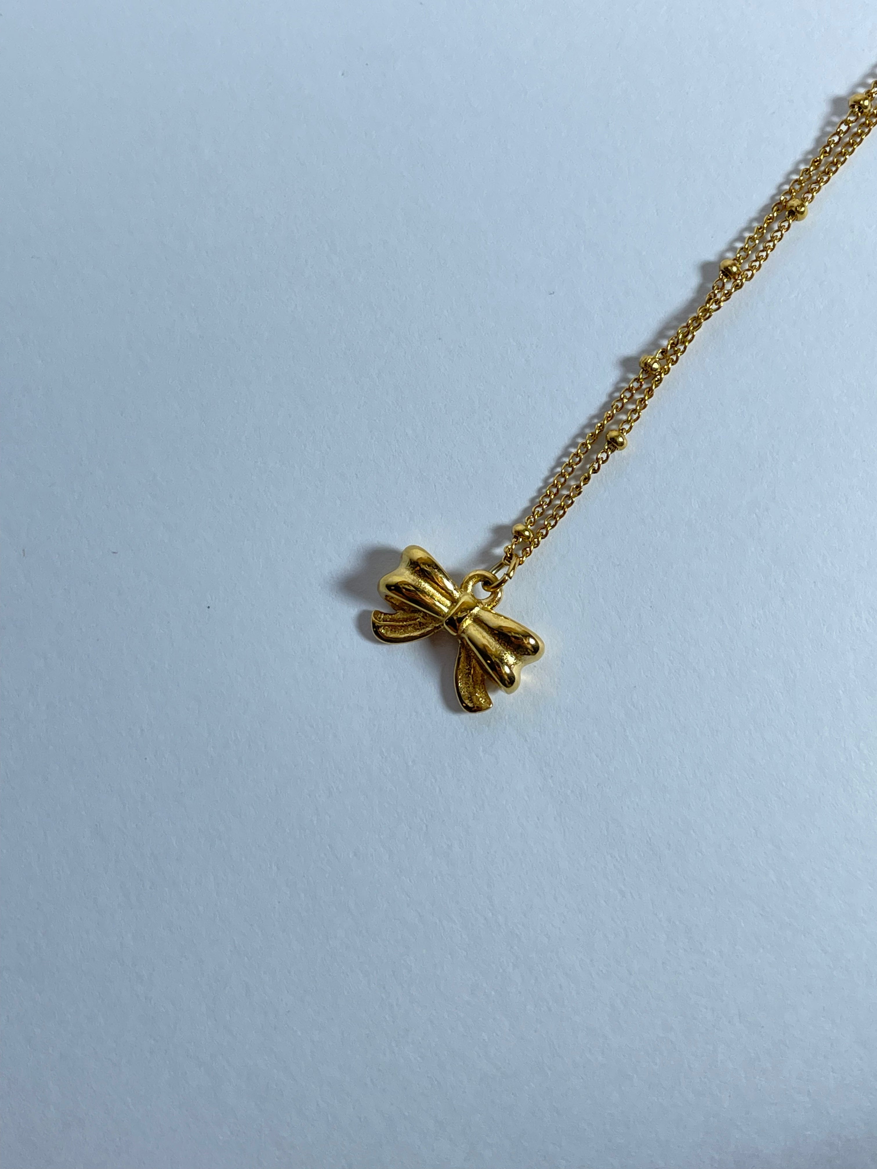 Petite Golden Bow Necklace