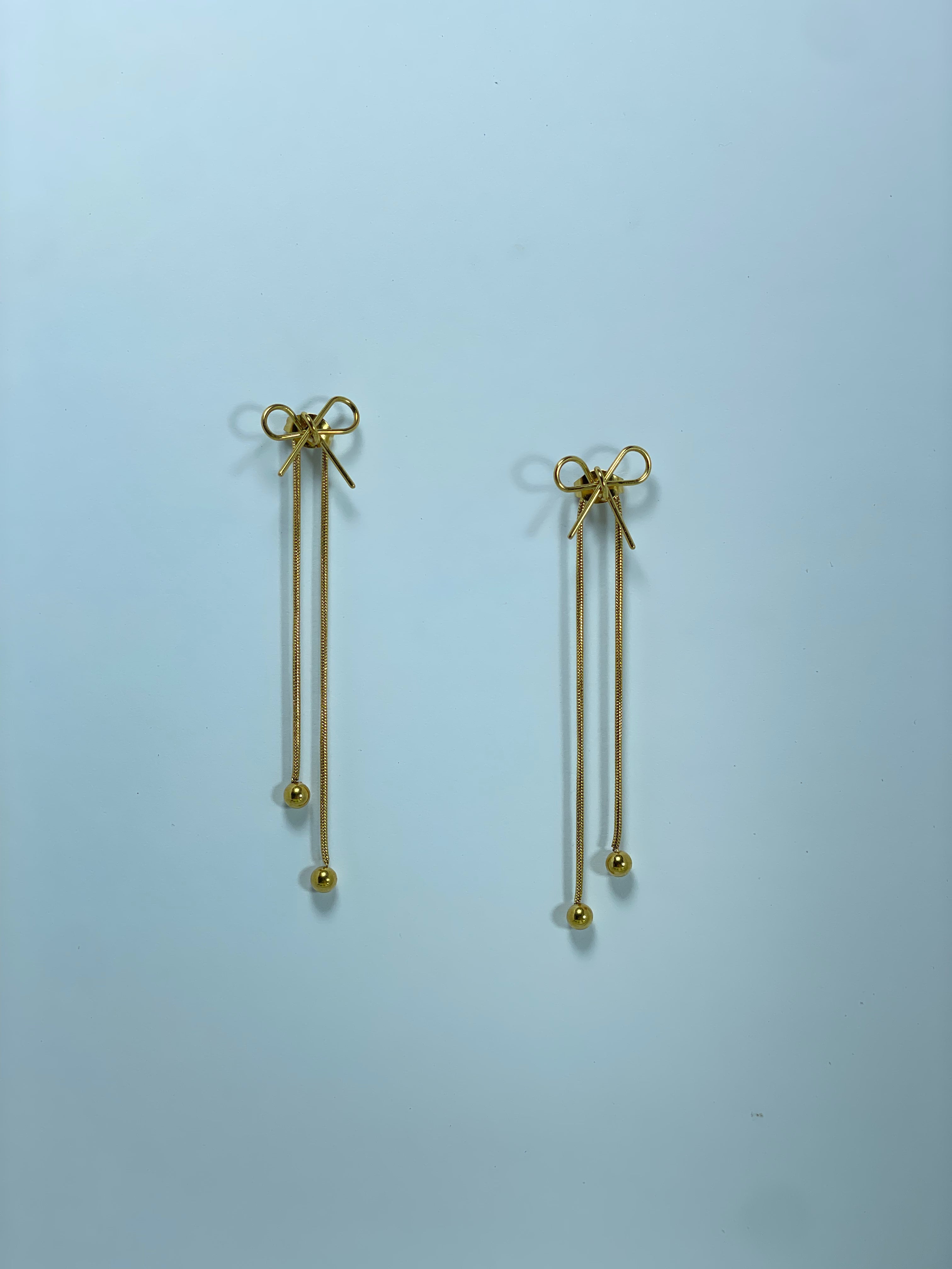 Gold Bow Tassel Earrings