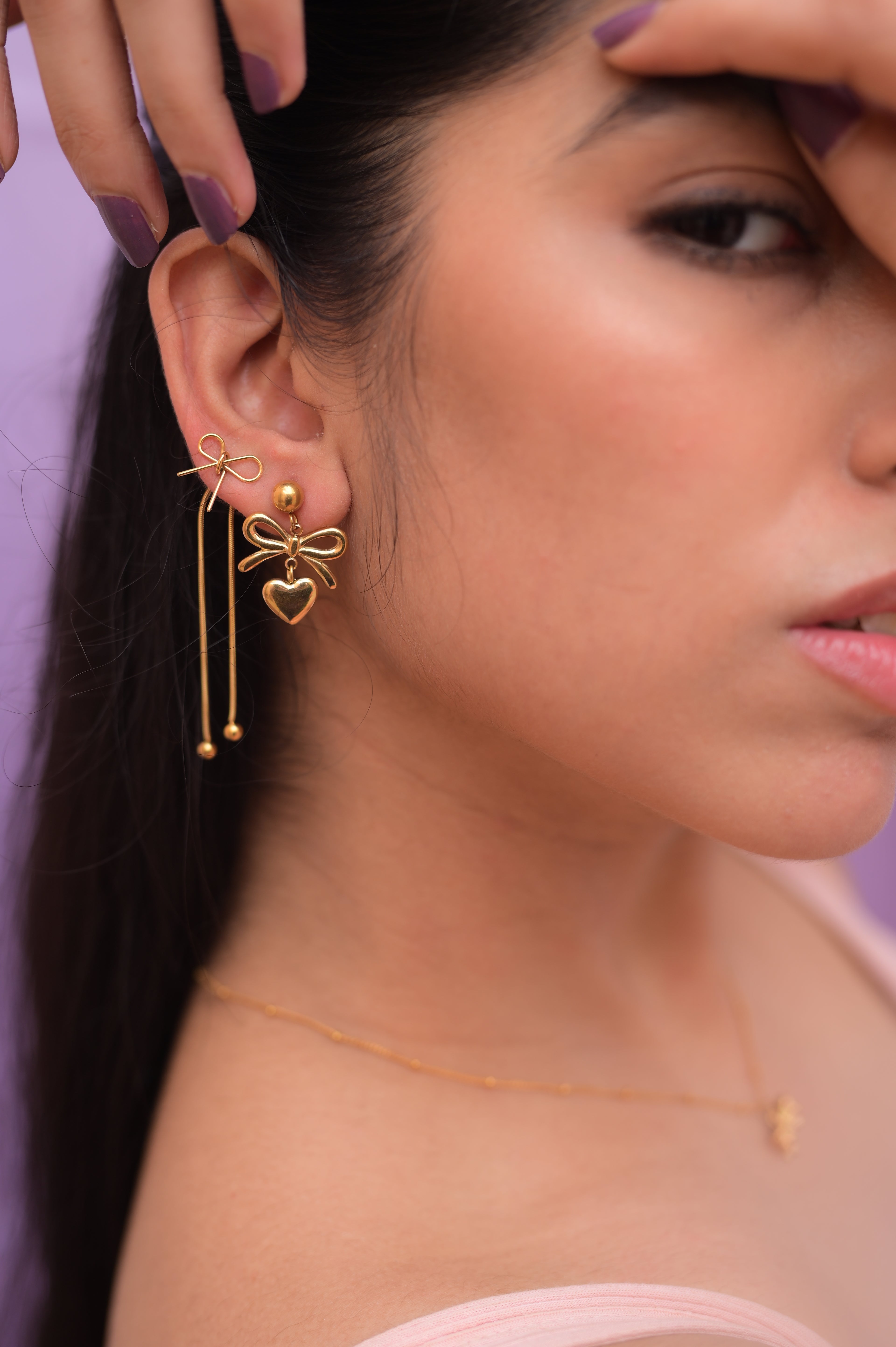 Gold Bow Tassel Earrings