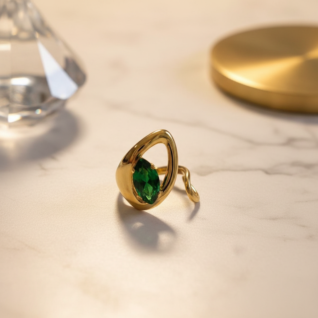 Emerald Teardrop Frame Ring – Elegant Background
