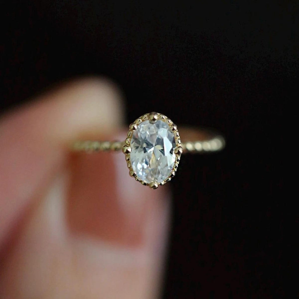 Oval Solitaire Beaded Halo Ring