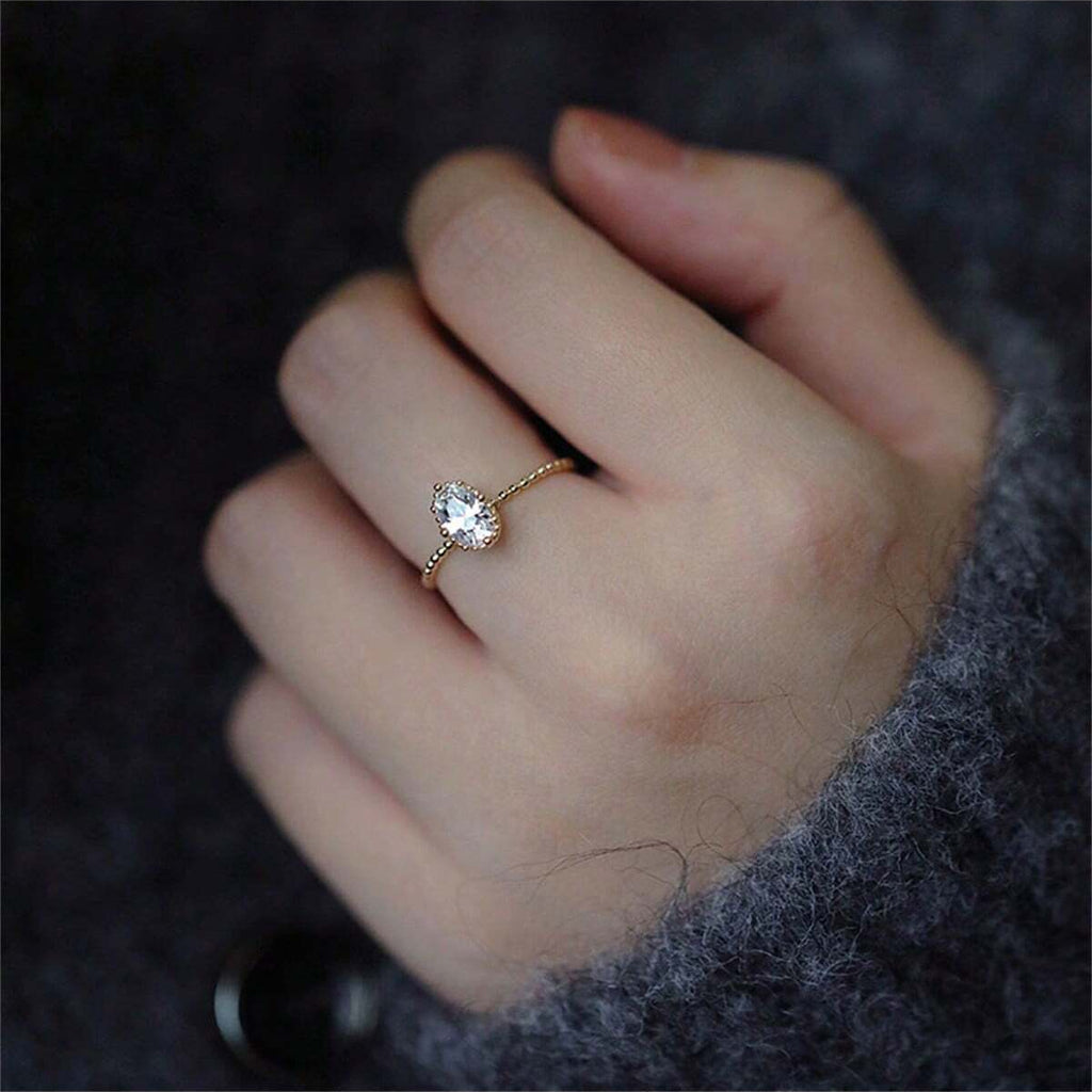 Oval Solitaire Beaded Halo Ring