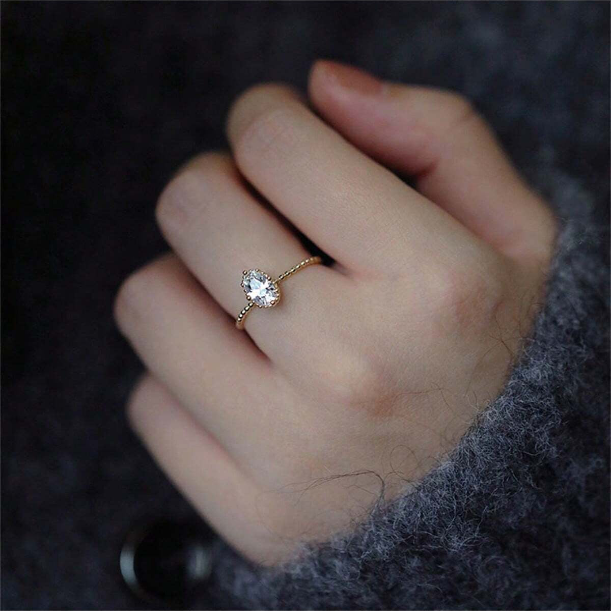 Oval Solitaire Beaded Halo Ring
