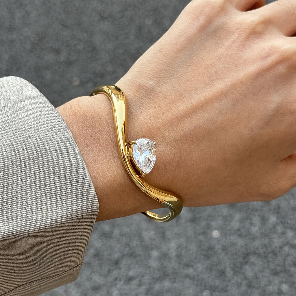 Gold Twisted Cuff Bracelet with Pear Crystal Solitaire