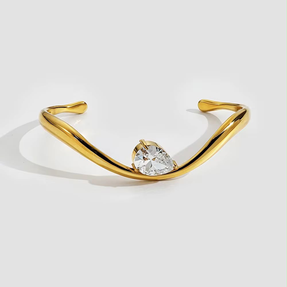 Gold Twisted Cuff Bracelet with Pear Crystal Solitaire